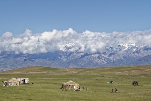 Mountains, fields and huts.